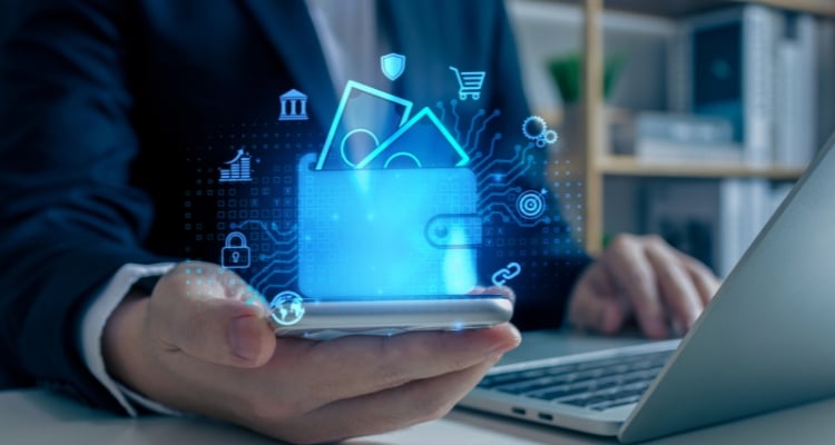 digital banking onboarding person accessing their digital wallet on their laptop