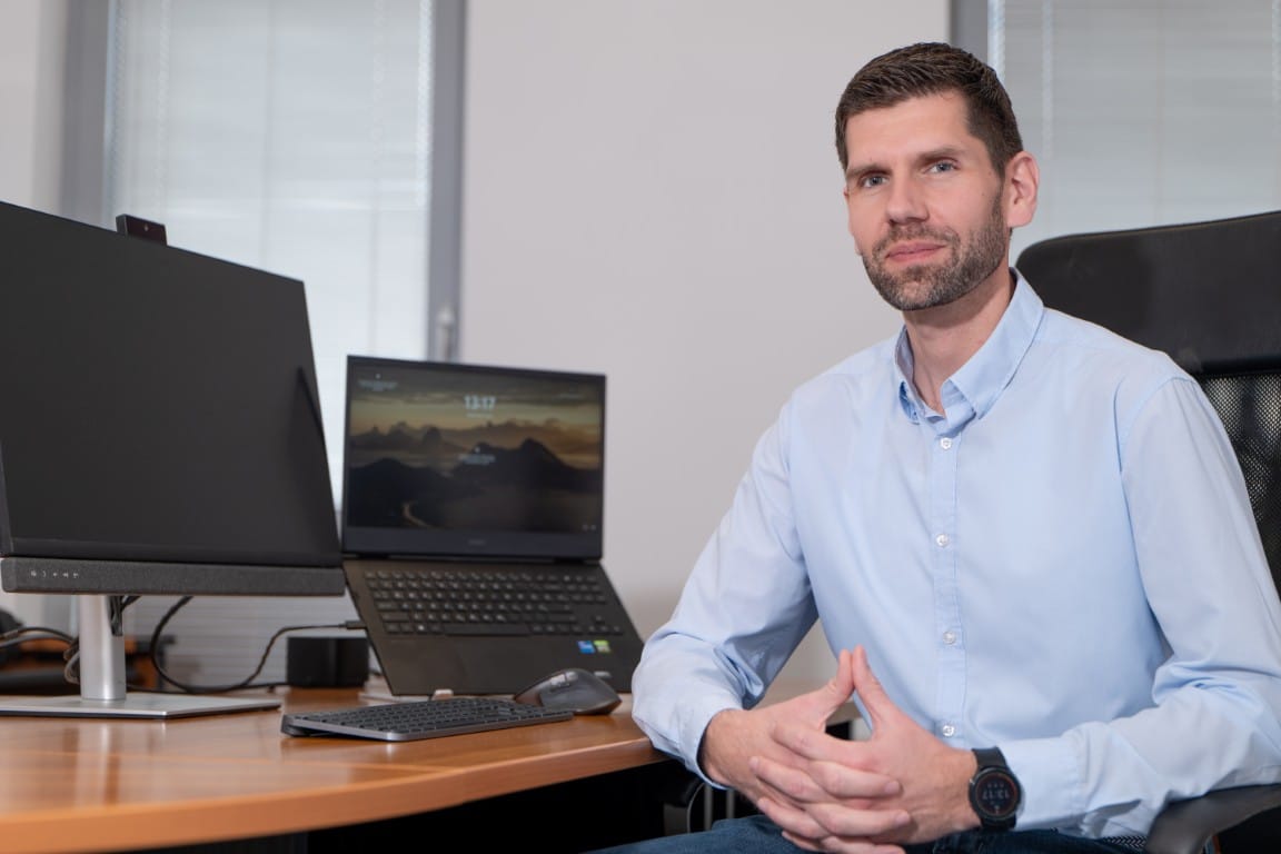 bpm director sitting in office of IT company 