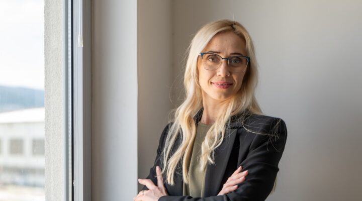 businesswoman lead software developer in IT company in a modern office smiling