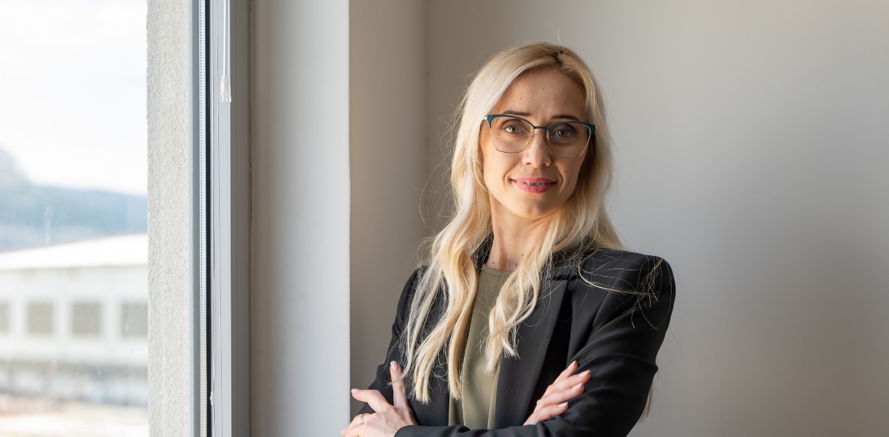 businesswoman lead software developer in IT company in a modern office smiling