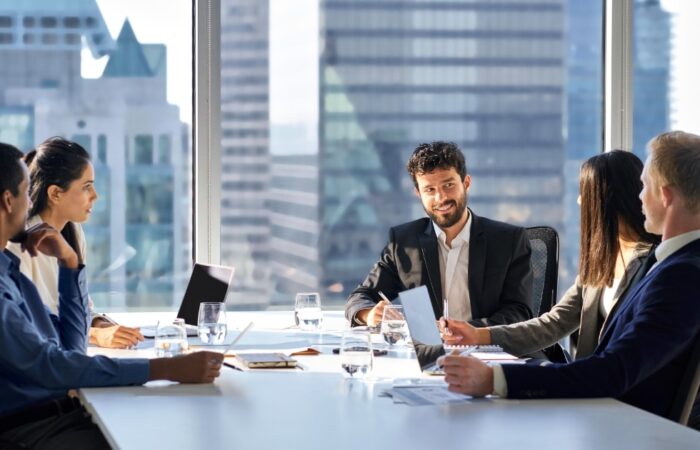 board members using digital tools to have efficient board meeting