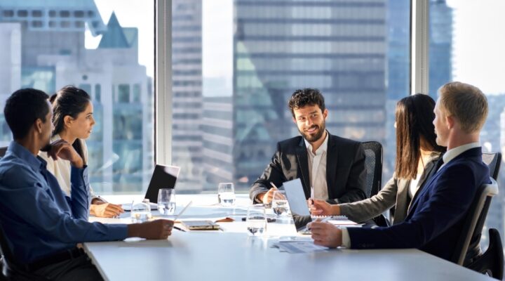 board members using digital tools to have efficient board meeting