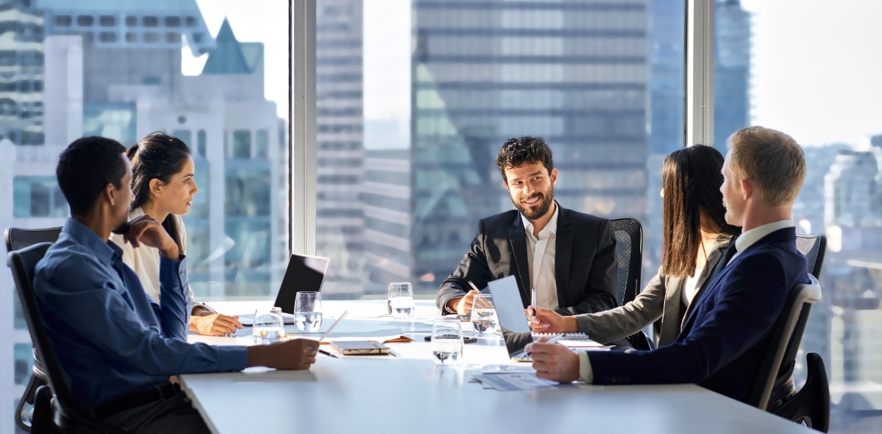 board members using digital tools to have efficient board meeting